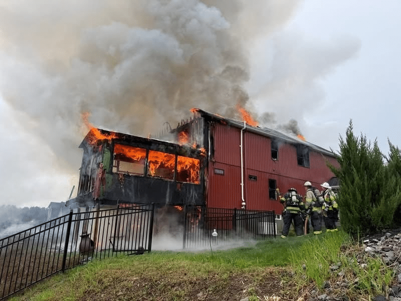 The Groton Fire Department extinguished a fire on Sunday, April 19, in a former barn that was converted into a residential structure at 180 Martins Pond Road. (Photo Courtesy Dunstable Fire Department)