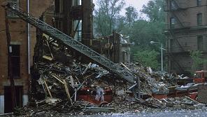 Ladder 15's 1971 Maxim ladder truck crushed in the collapse.