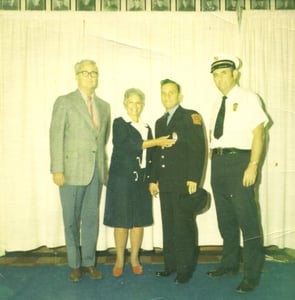 Promotion ceremony for Fire Fighter Charles Rozanski's promotion to Fire Lieutenant, October 2, 1957.