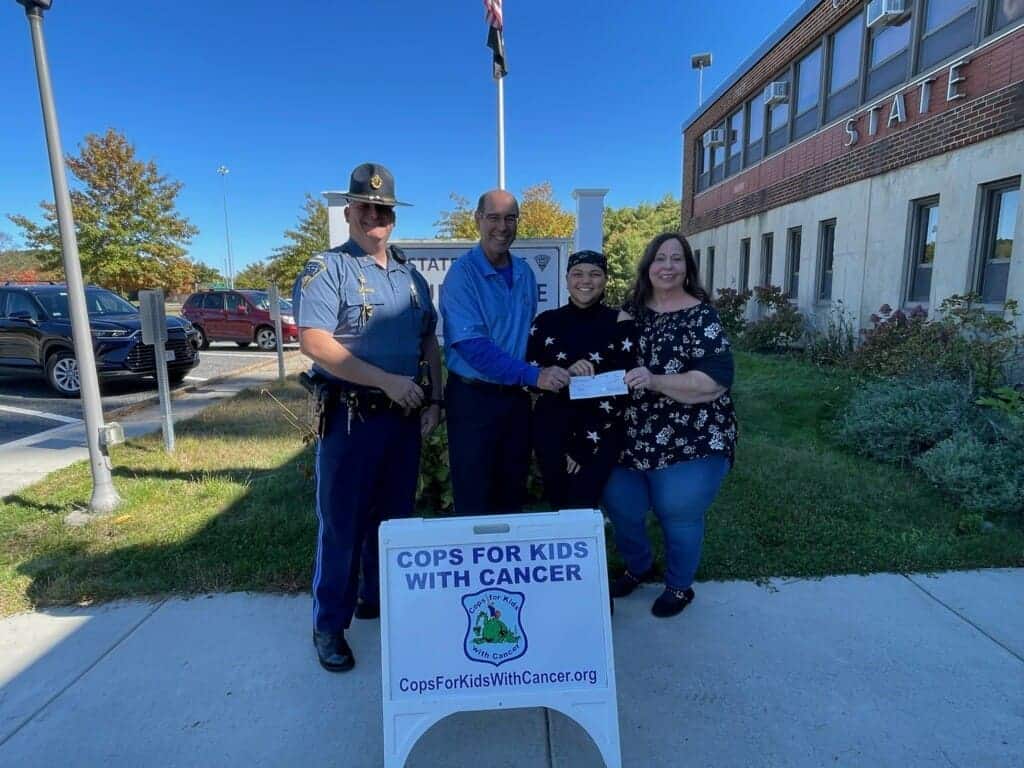 Cops for Kids Presents $5,500 Check to Cynthia Capillo at the State Police Barracks in Sturbridge