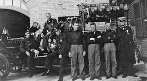 Engine 46's 1914 Robinson hose & chemical wagon and company members, Shop # 304, at quarters, 1914.