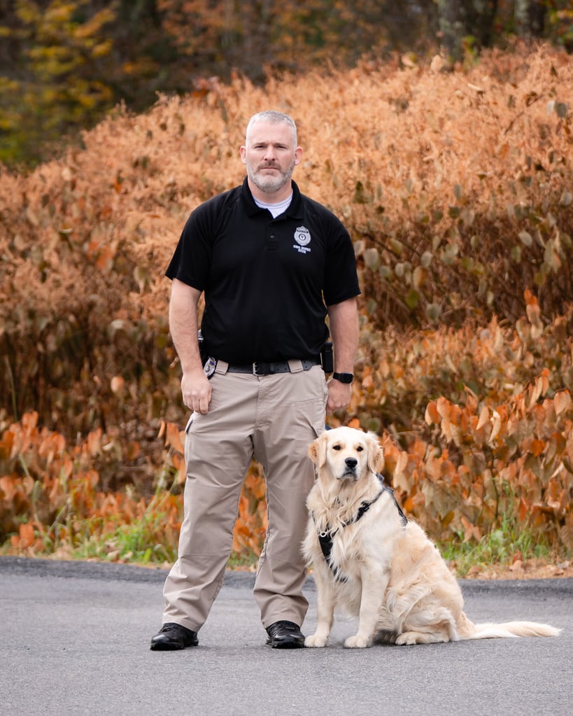 Blue, the Holbrook Comfort dog, with his handler.