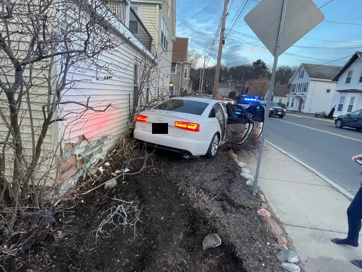 A car crashed into a home on Franklin Street in Stoneham on Friday after a vehicle pursuit. (Courtesy Stoneham Police Department)