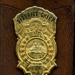 Badge of retired District Chief John L. Glynn, in 1950.