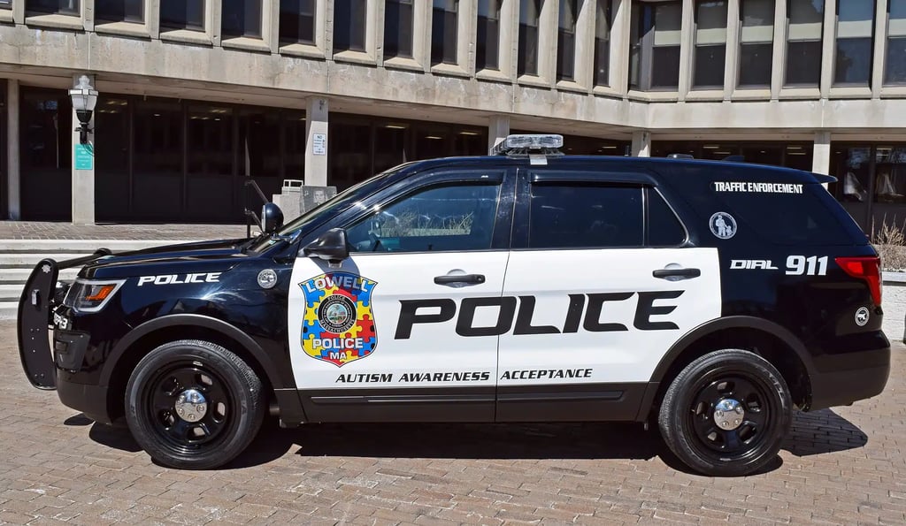 Lowell Police Department Unveils New Autism Awareness Cruiser John
