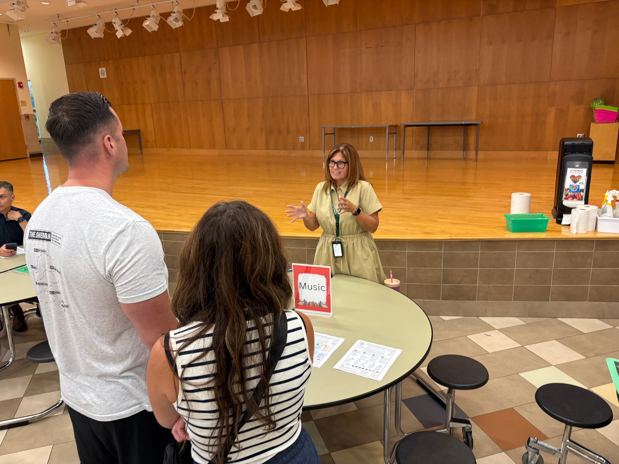 parent with staff at back to school night
