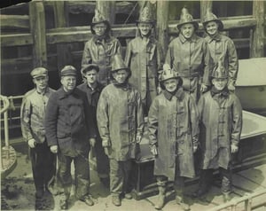 Members of Fireboat Engine 47, circa 1922. Capt. John Williams at right front.