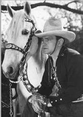 Cowboy movie star Buck Jones with his horse Silver