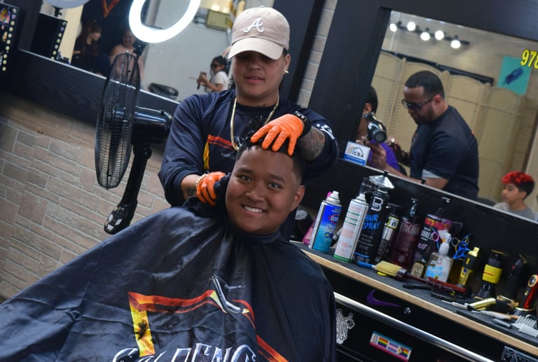 PHOTOS: Lowell Police Youth Services Partners with Golden Cuts to Offer Back to School Haircuts for Youth