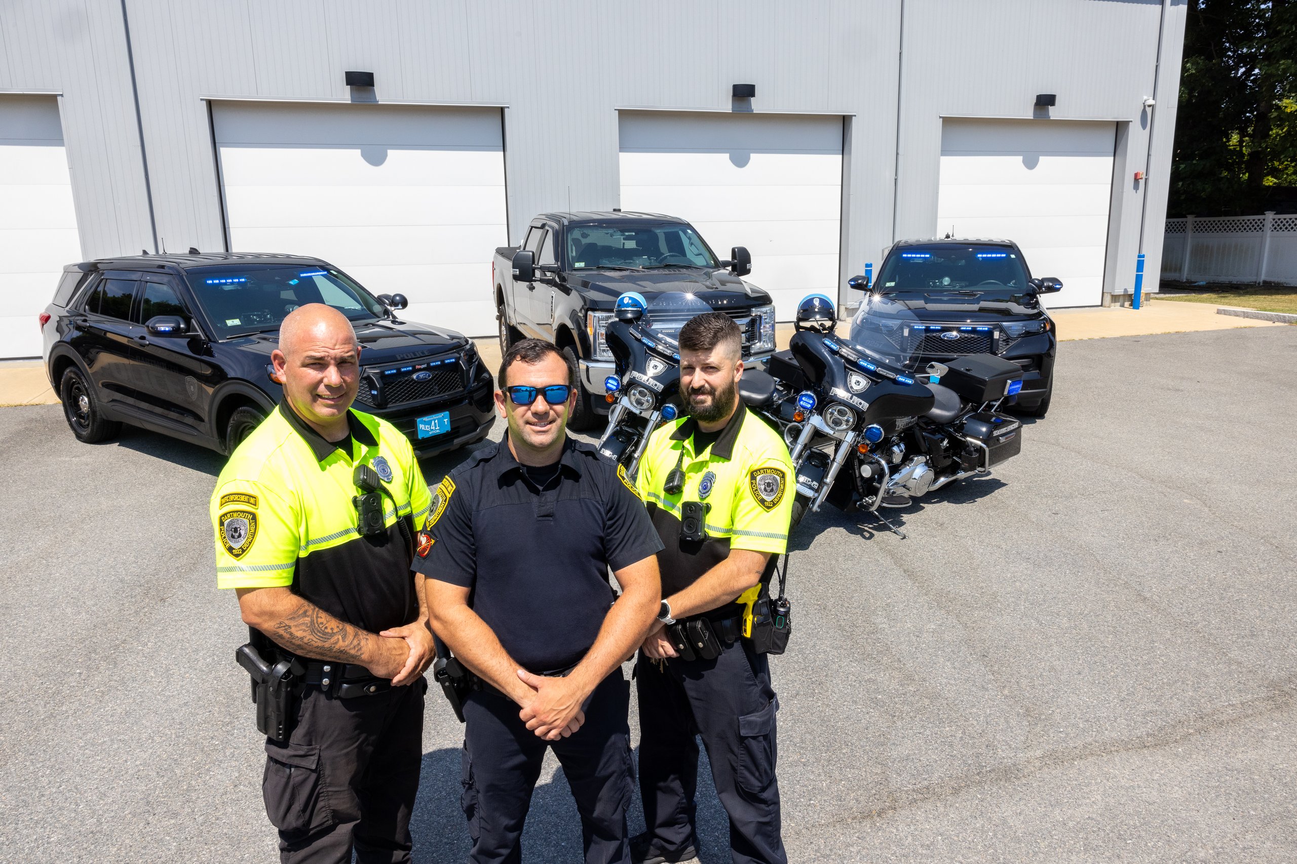Three Officer and Patrol Vehicles 
