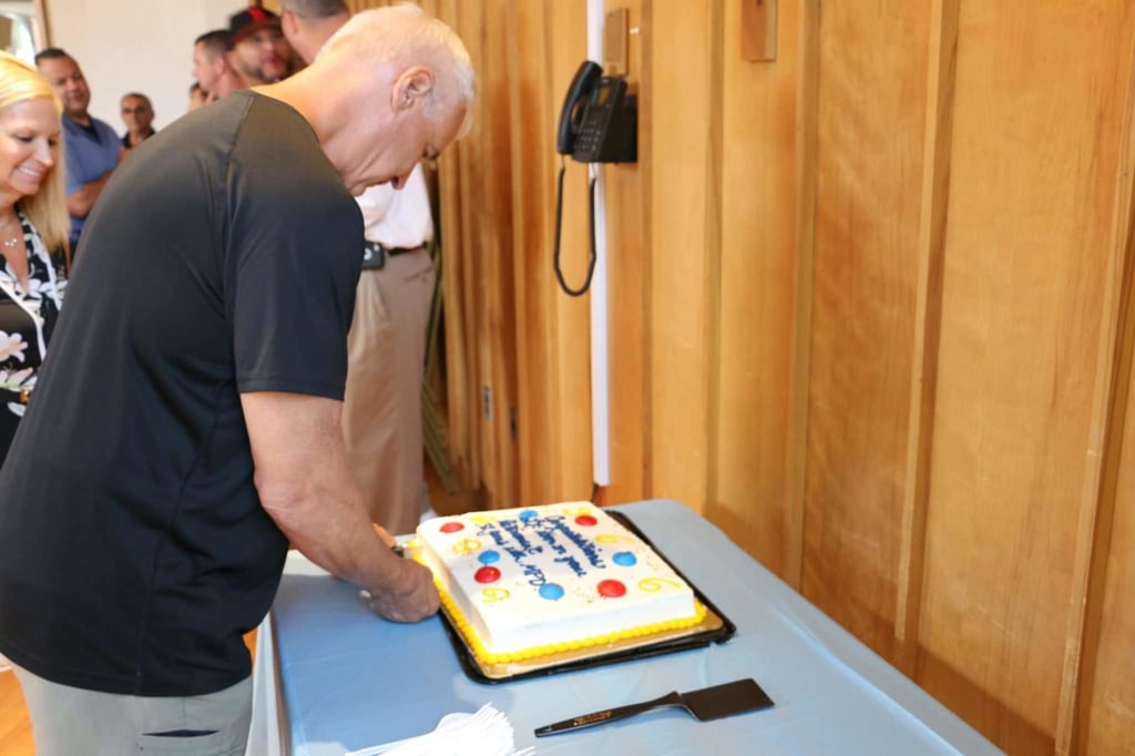 Lt. Korn cutting his cake.