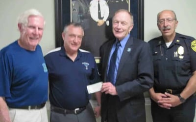 Falmouth Police Department. Mass. State Police Sergeant John Kotfila Gives $10,000.00 Donation