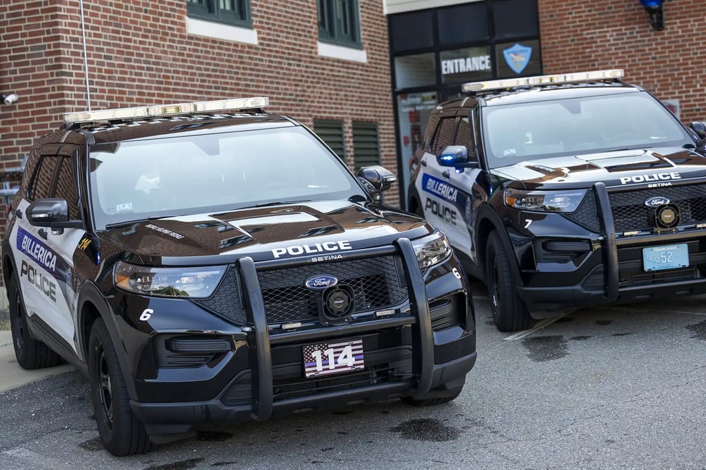 Two police cruisers.