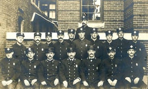 Members of Engine 22 & Ladder 13, with District 7 Chief John Grady, at 70 Warren Ave., South End, c. 1903.