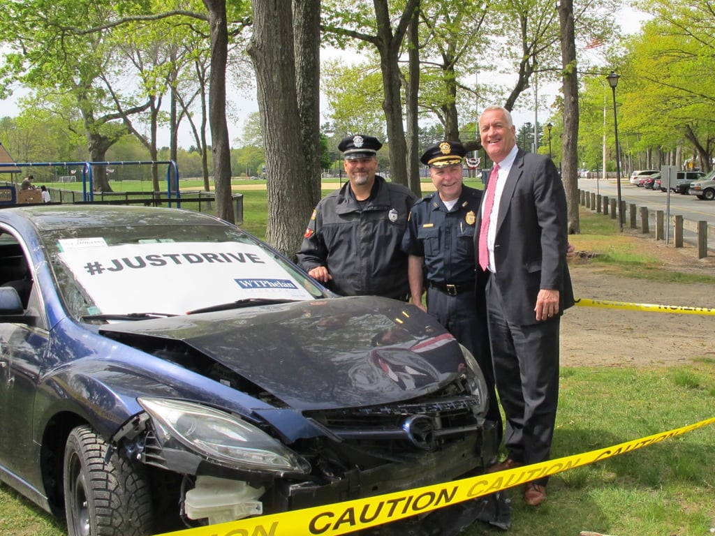 Left to right: Traffic Enforcement Officer Marc Saucier, Lt. James Graham and Robert Ramsey, owner of WTPhelan Insurance Agency of Lexington, Mass.