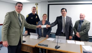 Left to right: TADS Founder Steve Boczenowski, Pepperell Police Chief David Scott, Selectman Melissa Tzanoudakis, Chairman Stephen Themelis, and Selectman Roland Nutter. (Courtesy Photo)