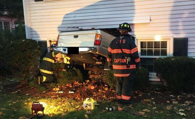 Chelmsford Police and Fire responded to 22 Middlesex St. at 5:20 p.m. after receiving numerous 911 calls that a vehicle had driven into the building (Chelmsford Police Department Photo)