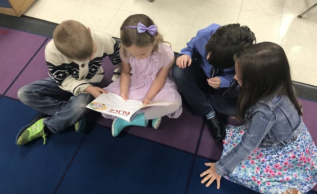 In perhaps the most telling representation of the requirements of the modern world, kindergartners from Rockland's Jefferson Elementary School read the book, "I'm Not Scared, I'm Prepared," an ALICE training book for children by Julia Cook. From left to right: Cillian O'Connor, Lily Kopycinski, Logan Cummins, and Paige Morse from Denise Creedon's Kindergarten class. (Courtesy Photo Rockland Public Schools)