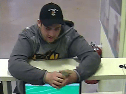 Kyle Nathan is seen in surveillance footage at the Citizen's Bank inside of Stop & Shop in Chelmsford. (Courtesy Photo)