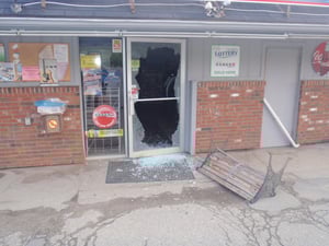 The glass front door was smashed and merchandise inside the store was stolen. (Newport Police Courtesy Photo)