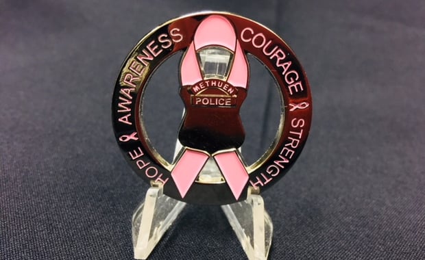 Methuen Police have created new uniform pins to raise awareness for breast cancer. (Courtesy Photo)