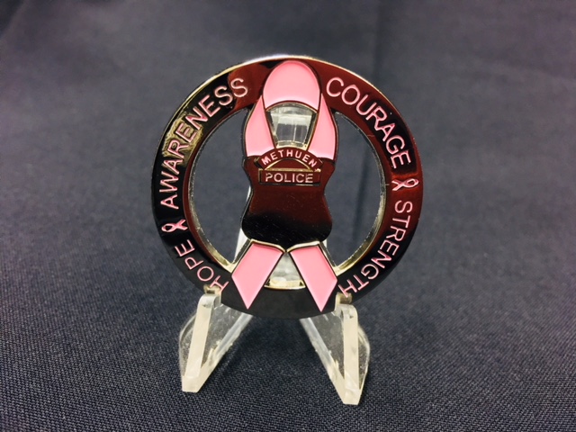 Methuen Police have created new uniform pins to raise awareness for breast cancer. (Courtesy Photo)