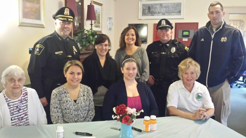 Top row from left to right: Stoneham Police Chief James McIntyre, Board of Health Member Teresa Dean, RN, Senior Center Director Maureen Canova, Stoneham Police Officer John Burton, and Stoneham Police Detective Stephen Carroll. Bottom row from left to right: Jean Reynolds, Alena Sordello, Anna Shields, and Virginia Powers.