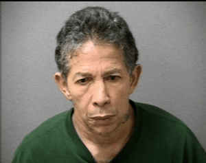 PORFIRIO SANTIAGO, AGE 55, OF LOWELL. (Chelmsford Police Booking Photo)