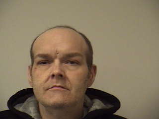 RAYMOND HOWARD, age 42, of Littleton was arrested for allegedly selling Oxycontin in the community. (Littleton Police Department/Booking Photo)