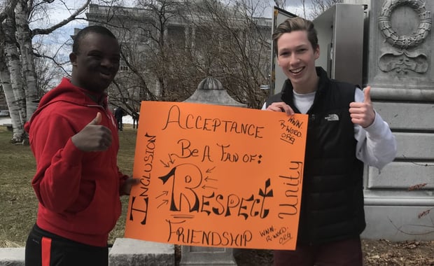 Oyster River High School 10th grader Tinuifeoluwa Afolayan and ORHS Best Buddies Chapter President Joe Morrell at the Best Buddies Spread the Word to End the Word Rally in Concord (Courtesy Photo Joe Morrell)