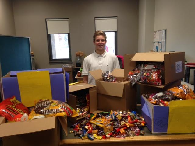 Hooper Ward, and eighth grade student at MVMMS, worked with students and staff to collect and donate around 150 pounds of Halloween candy to troops overseas. (Courtesy Photo)