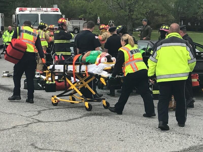 An injured student in the mock car crash is loaded into an ambulance to be transported to the hospital.