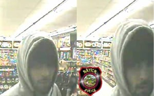 Natick Police are searching for a white male, roughly 20-30 years old, with a beard and wearing a gray hooded sweatshirt, gray sweatpants, and black and white sneakers. (Courtesy Photo)