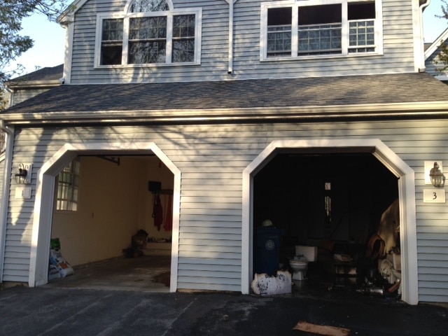 While crews were battling a brush fire, a garage fire broke out on Arborwood Drive.