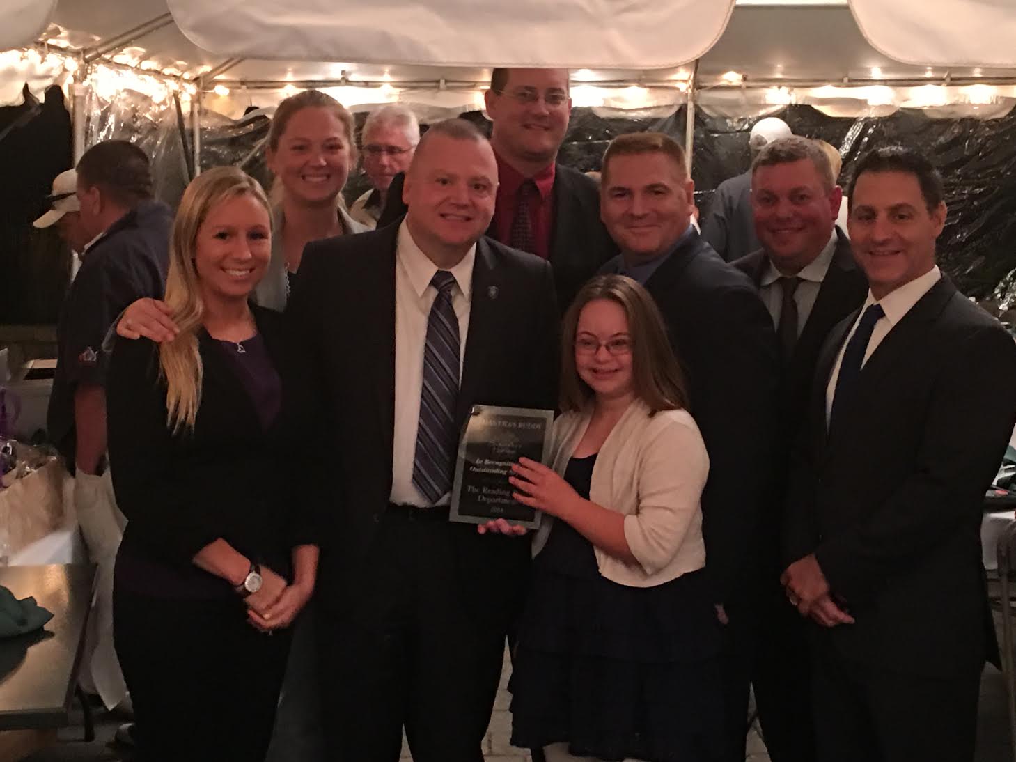Several RAD instructors from the Reading Police Department receieved Samantha's Buddy Award last week. Front row, left to right: Officer Kaylyn Gooley, Chief Mark D. Segalla, Samantha Gibbs, Deputy Chief David J. Clark, Lt. Detective Richard Abate. Back row, left to right: Community Service Officer Kristen Stasiak, Officer Ian Nelson, Officer Michael. Scouten (Courtesy Photo)
