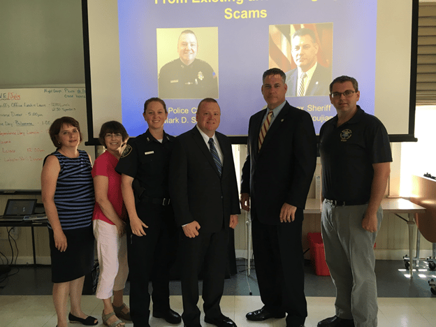 Left to right: Jane Burns, Elder and Human Service Administrator, Sharon Thomas, Senior Center Coordinator, Community Service Officer Kristen Stasiak, Chief Mark D. Segalla, Middlesex Sherriff Peter J. Koutoujian, Valentino Capobianco, Deputy Director of Community Affairs for Middlesex Sherriff’s Office. (Courtesy Photo)