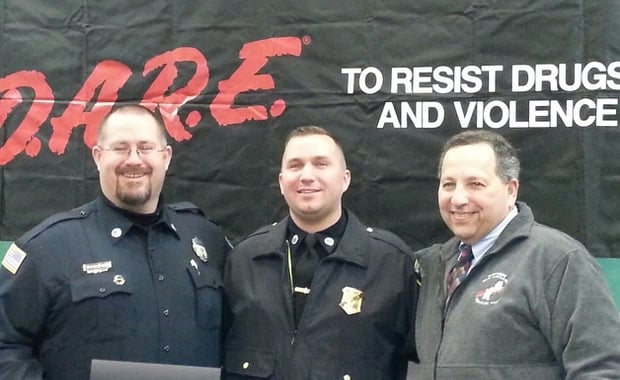 Pictured left-to-right are Officer Woodworth, Sgt. Kmiec, and Domenic DiNatale, Director DARE Massachusetts at Officer Woodworth's D.A.R.E. Officer Graduation ceremony held in Concord NH. (Courtesy of the Ipswich Police department)