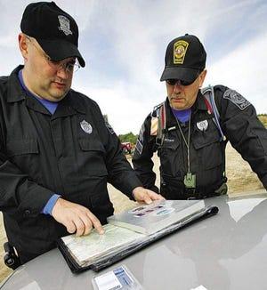 Officer John Borges (Left) was SEMLEC's "Go-To" Person for Search and Rescue Operations and Strategies and he was responsible for locating countless missing persons during his career, often working long hours past his shift without putting in for overtime.