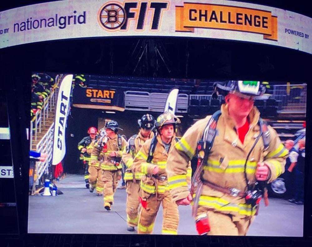Gloucester Firefighters appear on the big screen at the TD Garden as they participate in a prior Boston Bruins BFit Challenge. (Photo Courtesy Gloucester Fire Department)