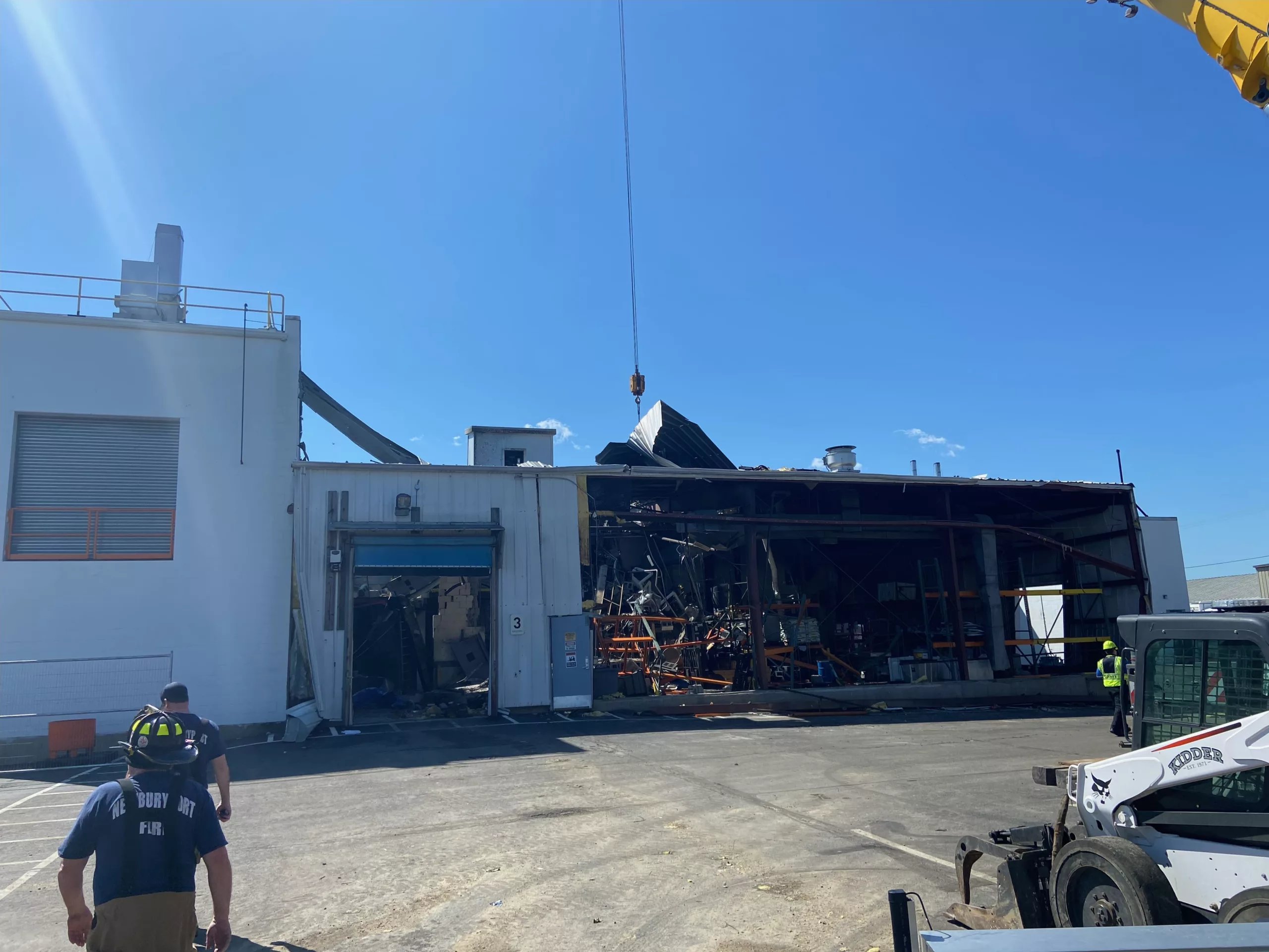 Fire crews and private contractors remain at the Seqens plant on Monday. (Courtesy Photo/Newburyport Fire Department)
