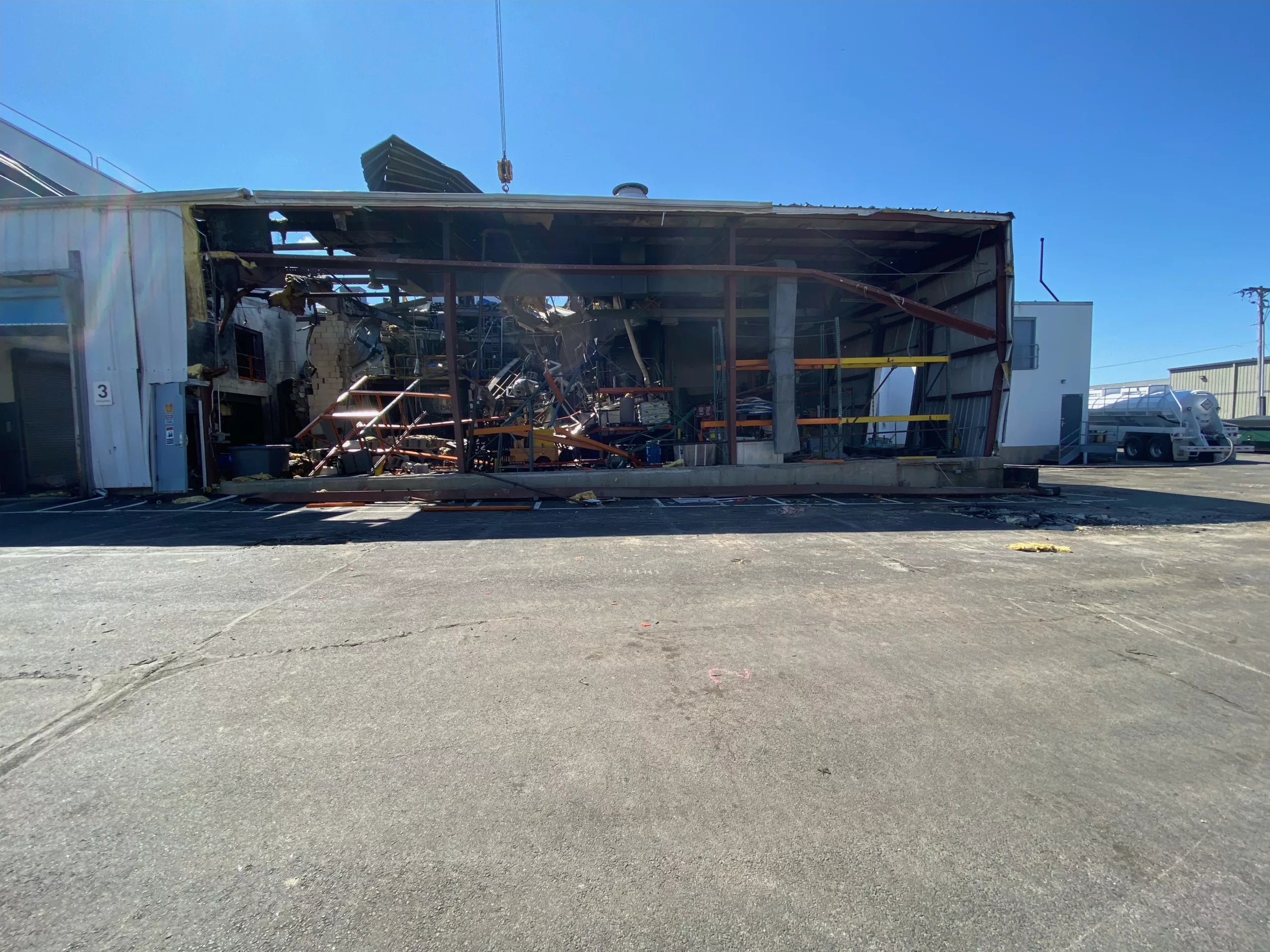 Fire crews and private contractors remain at the Seqens plant on Monday. (Courtesy Photo/Newburyport Fire Department)