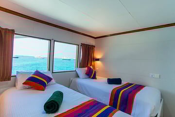 Emperor Voyager liveaboard Maldives upper deck cabin
