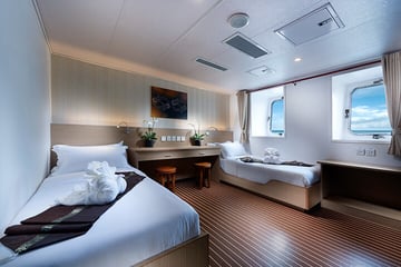 White Manta Liveaboard Indonesia main deck cabins