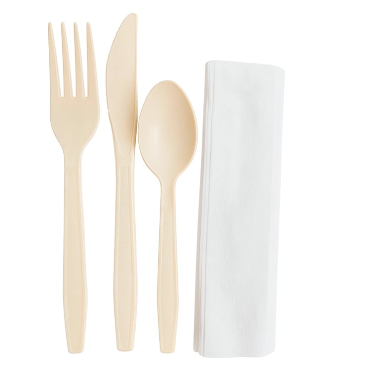 beige plastic cutlery set with knife, fork, spoon, white napkin