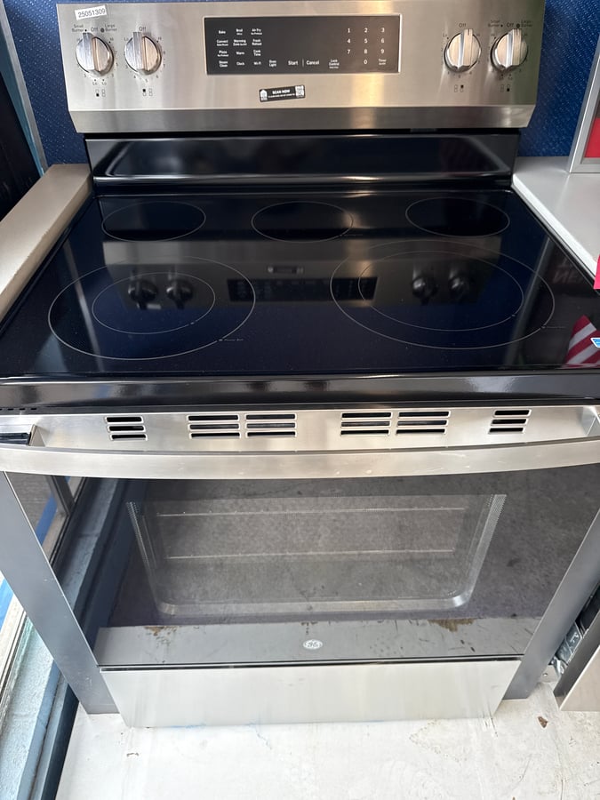 GE stainless steel glass top range - Image