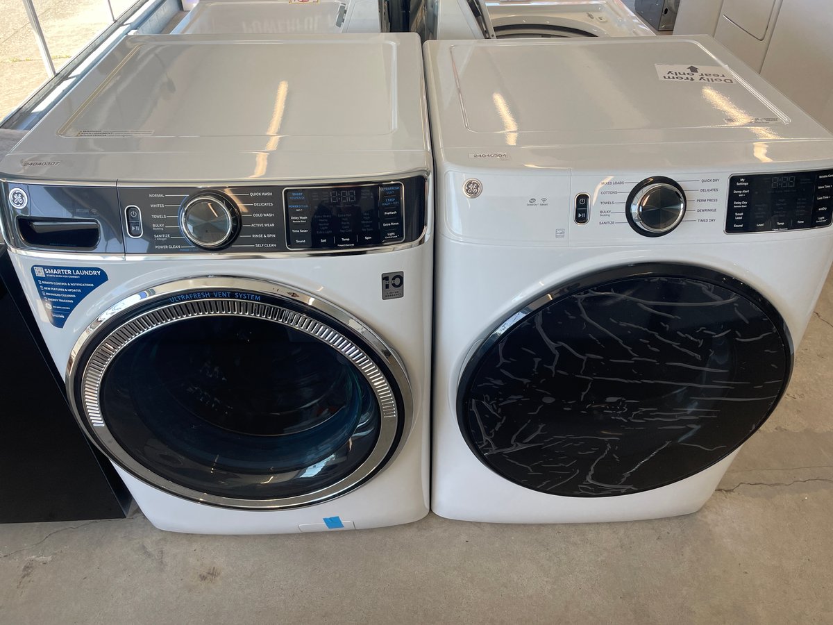 New open box GE front load washer and dryer set - Image