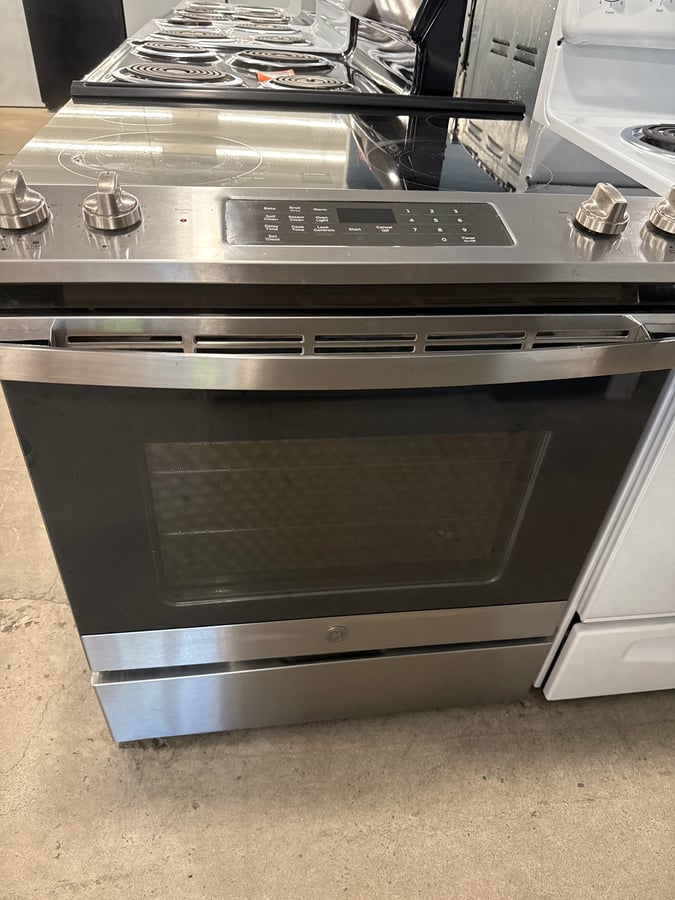 GE slide in range stainless steel. - Image