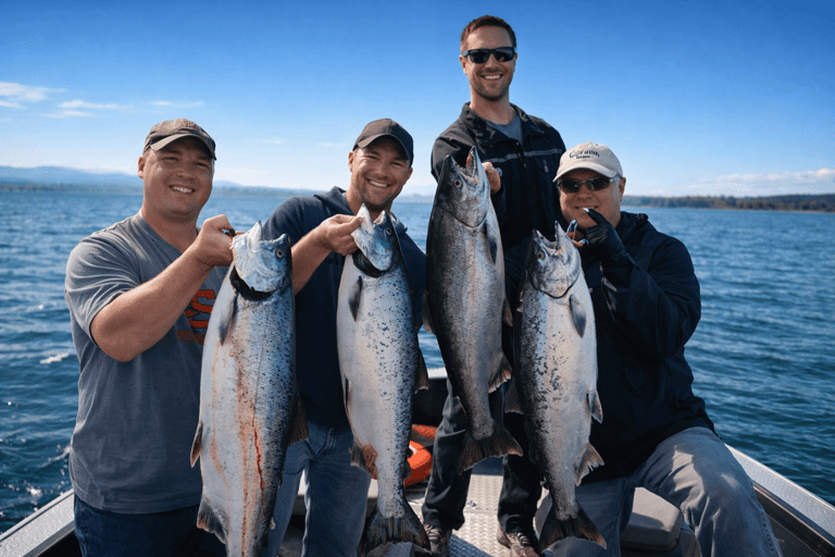 Group of anglers showing their fall Chinook salmon catches.