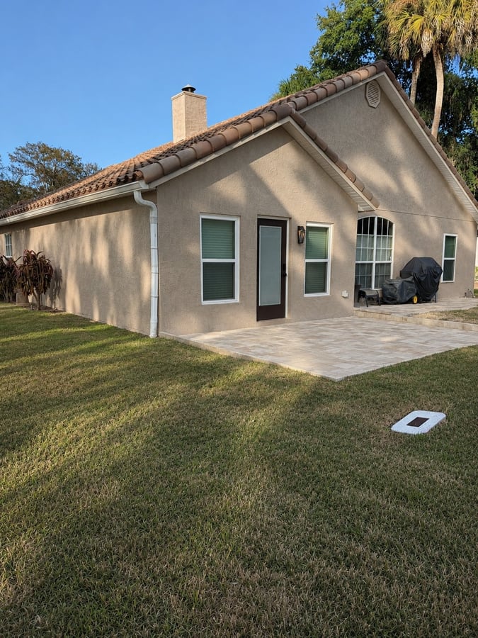 New travertine paver patio at a Winter Springs home