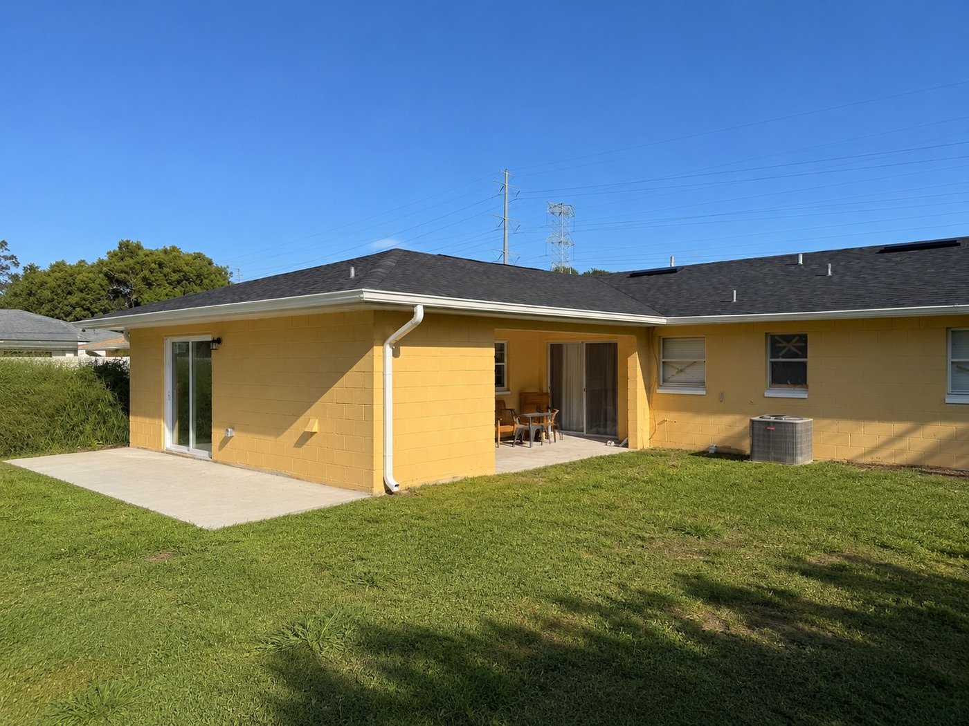 Orlando ADU addition with new roof and covered back patio